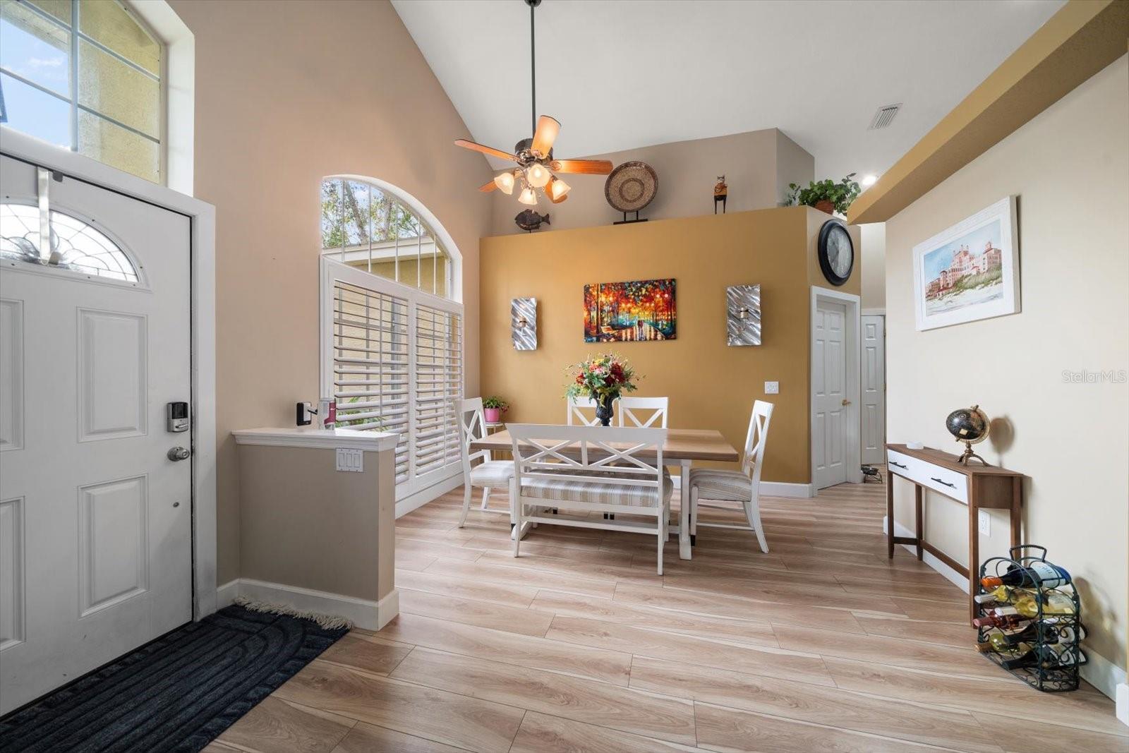 Dining room with vaulted ceilings