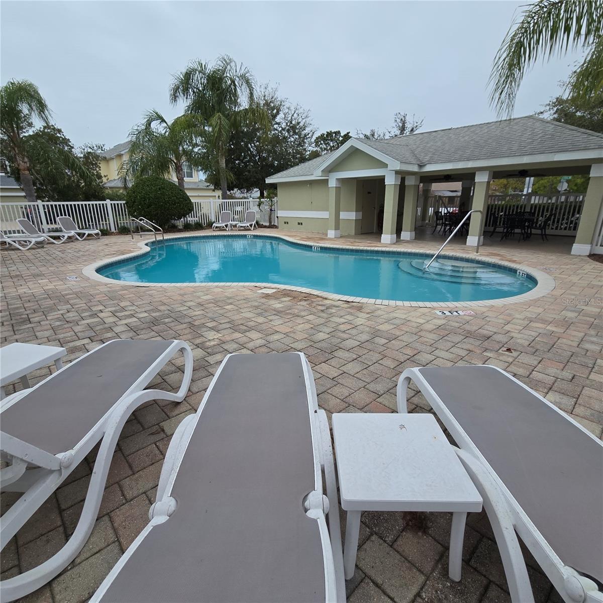 Sparkling community pool and cabana