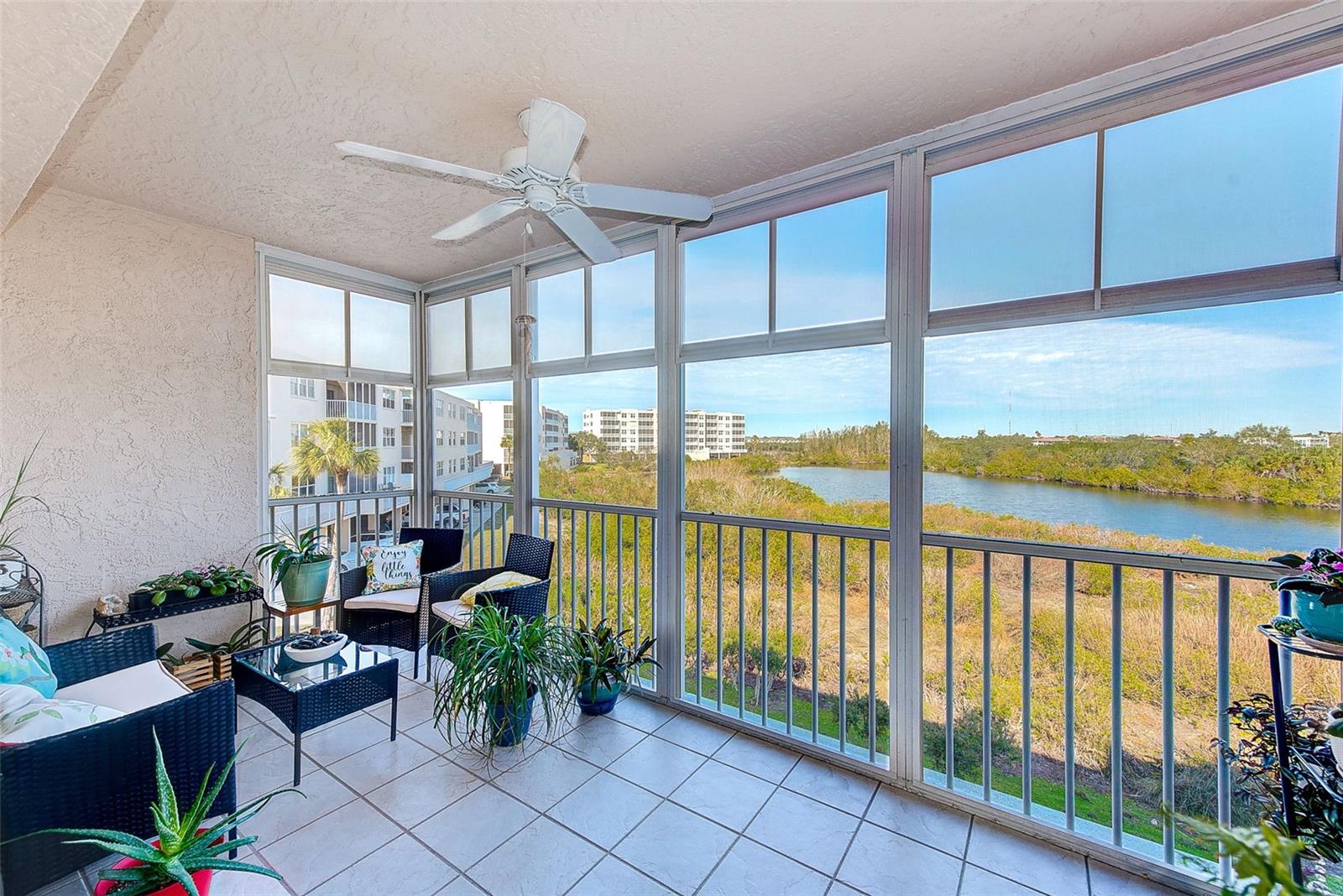 Screened balcony with relaxing views