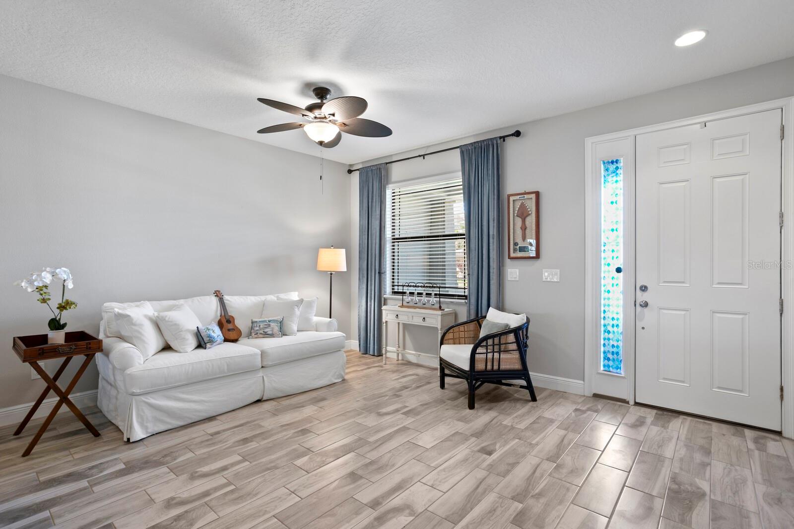 The home opens to a formal living room