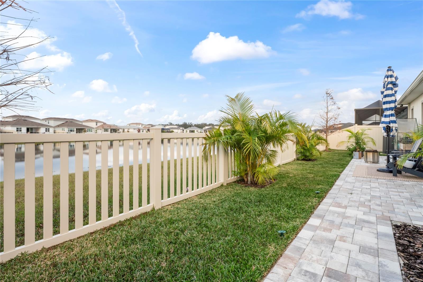 Rear Gated Paved Patio/ Pond View