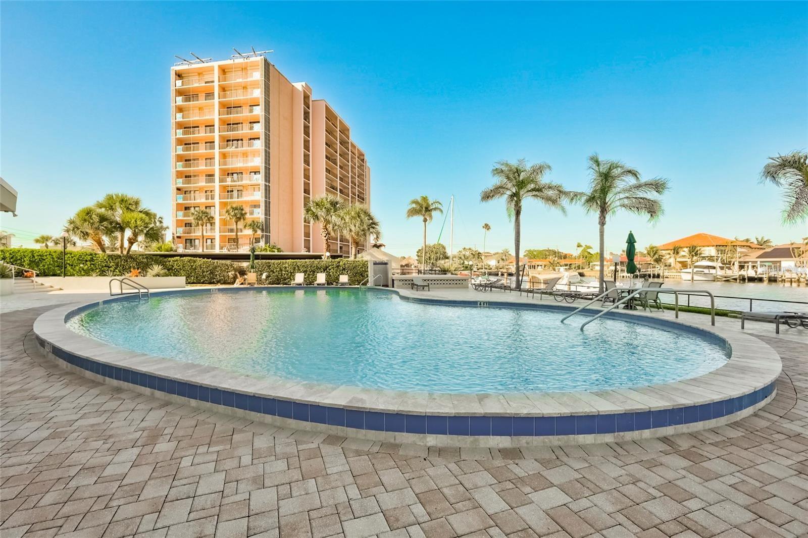 Enjoy a dip in the lovely pool overloking the water