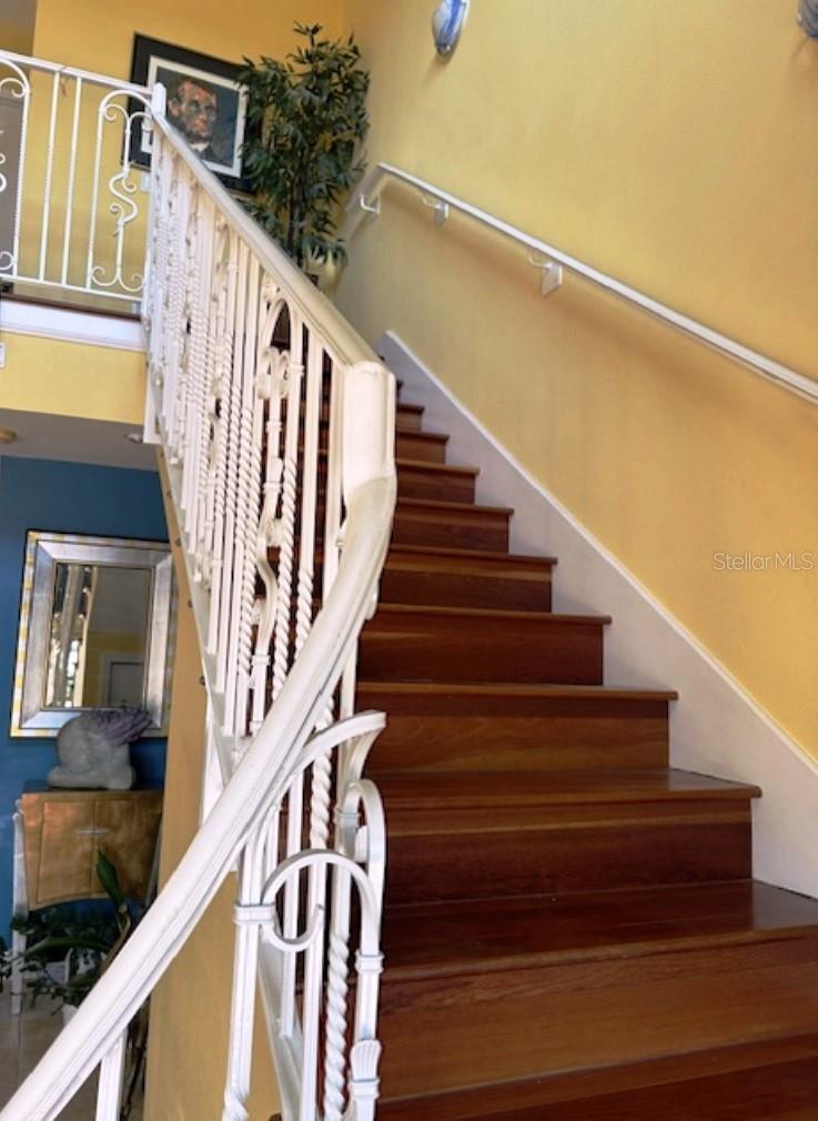 Brazilian cherry wood staircase with iron rail