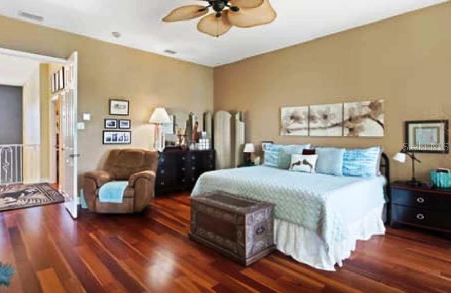 Huge Master Bedroom with Brazilian wood floors