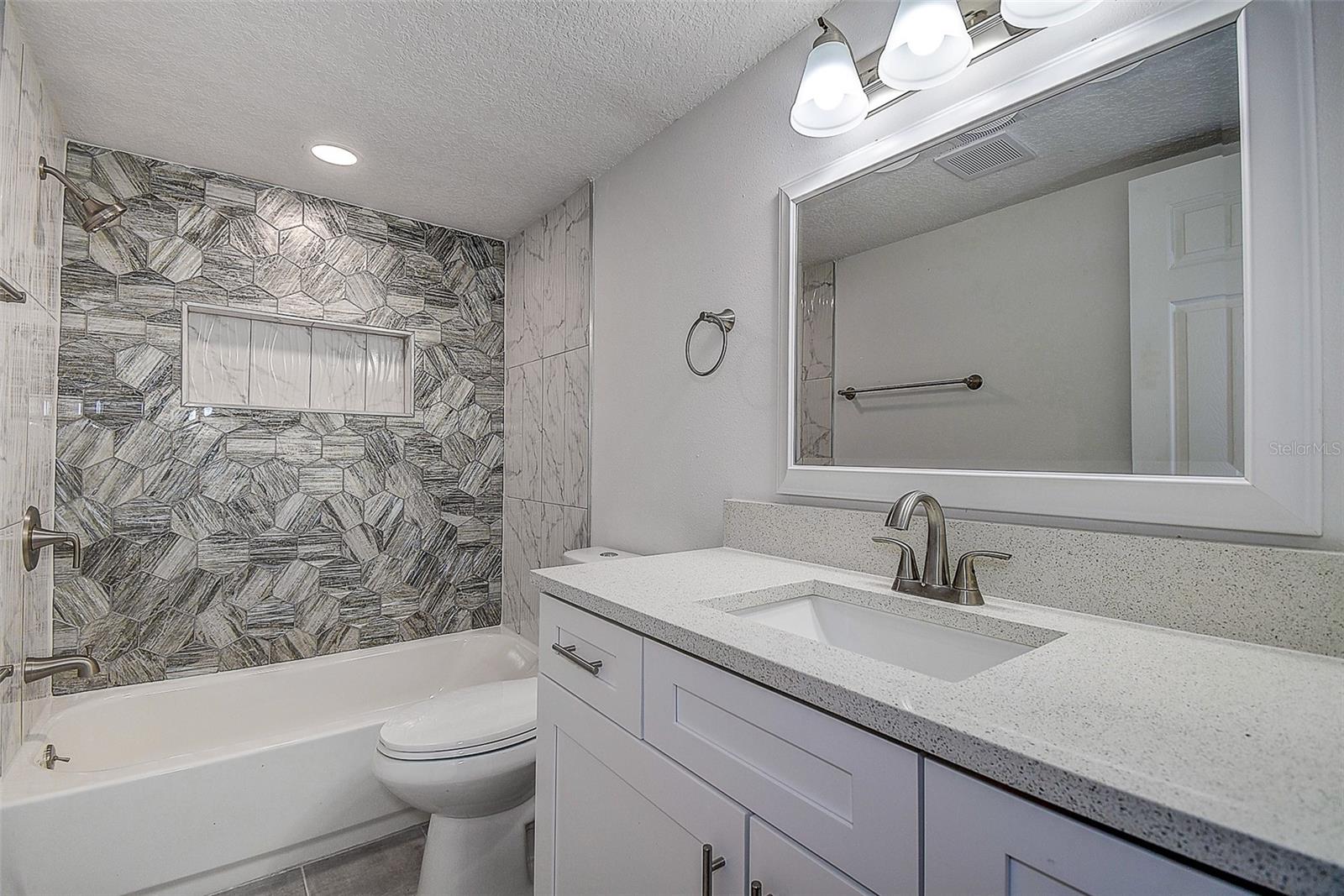 En suite bathroom with dual sinks