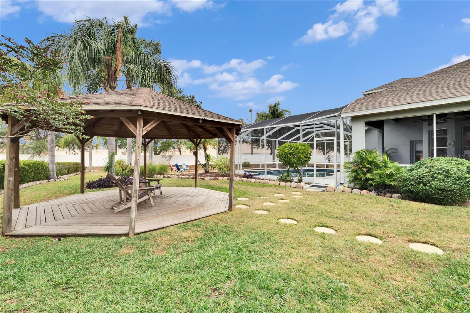 STEPPING STONES LEADING FROM THE LANAI TO THE PERGOLA