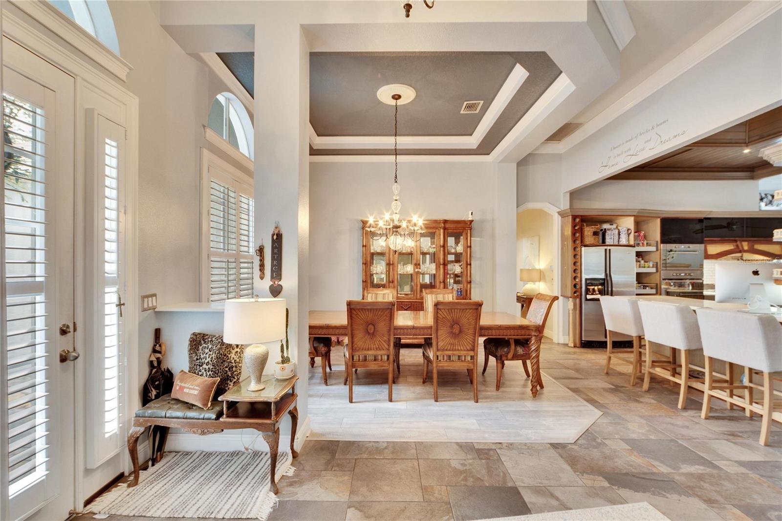 LEFT OF FOYER IS THE FORMAL DINING ROOM