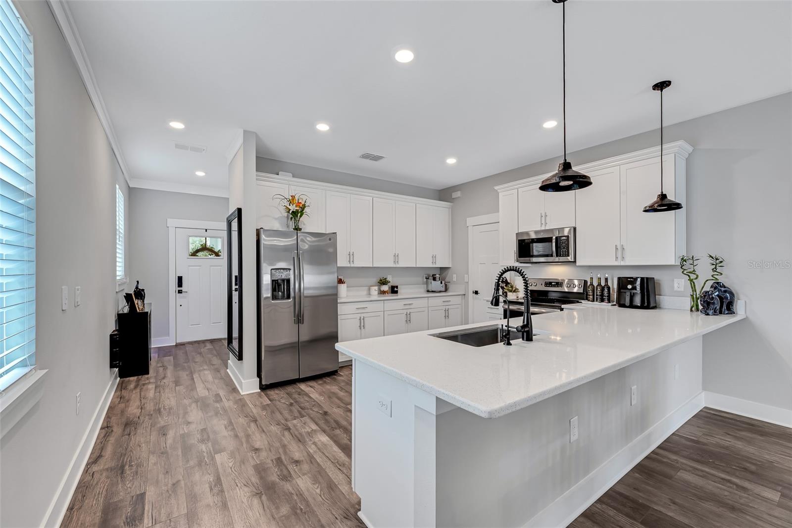 Kitchen toward front door.