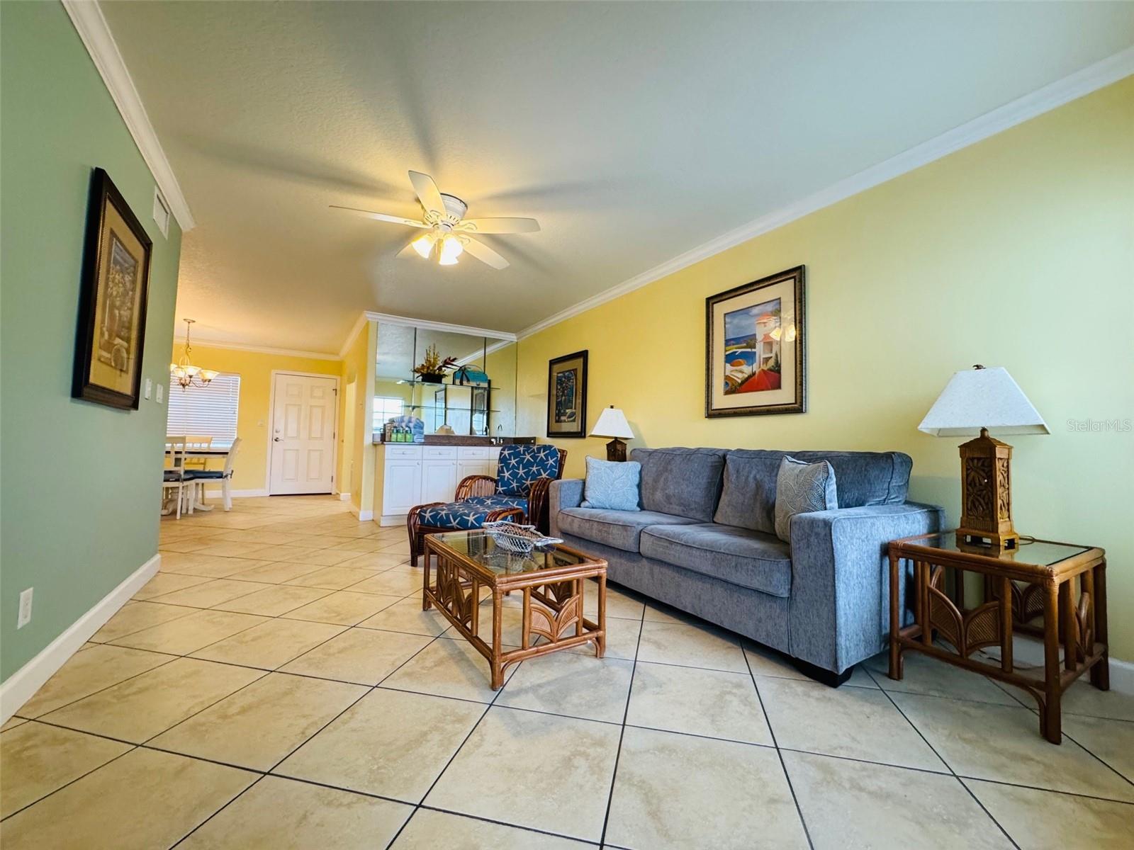 Living room facing dining area and kitchen