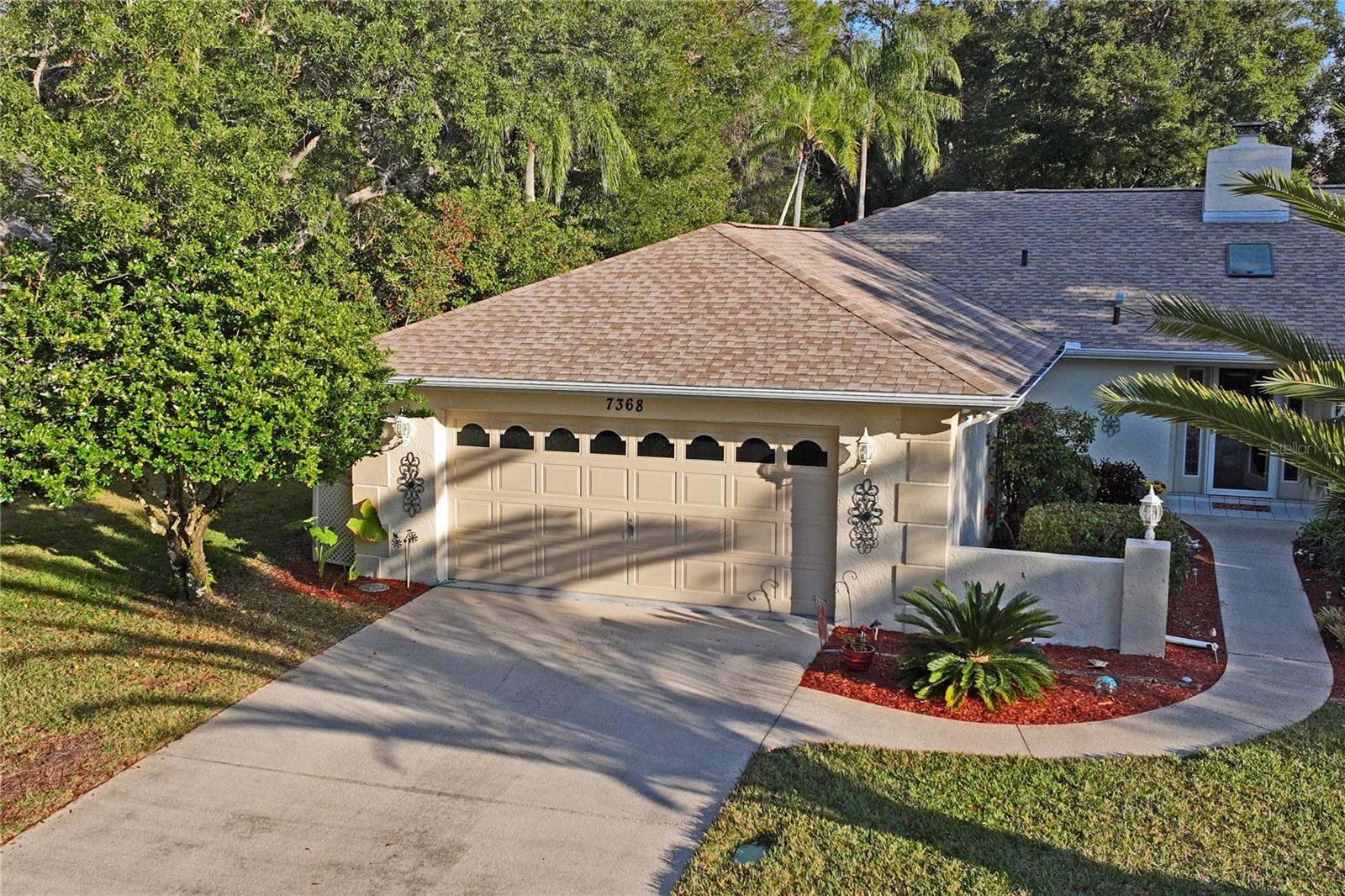 Garage and Walkway to Entrance Area