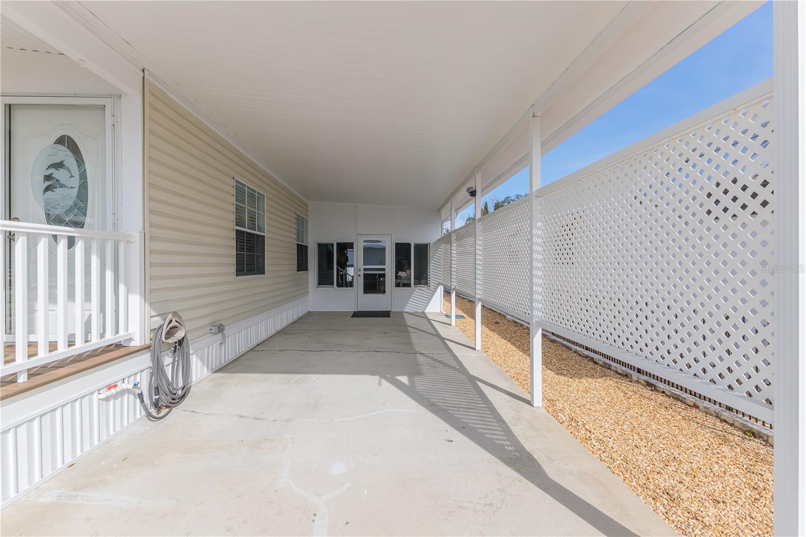 Carport looking towards what is now used as a storage area for current owners