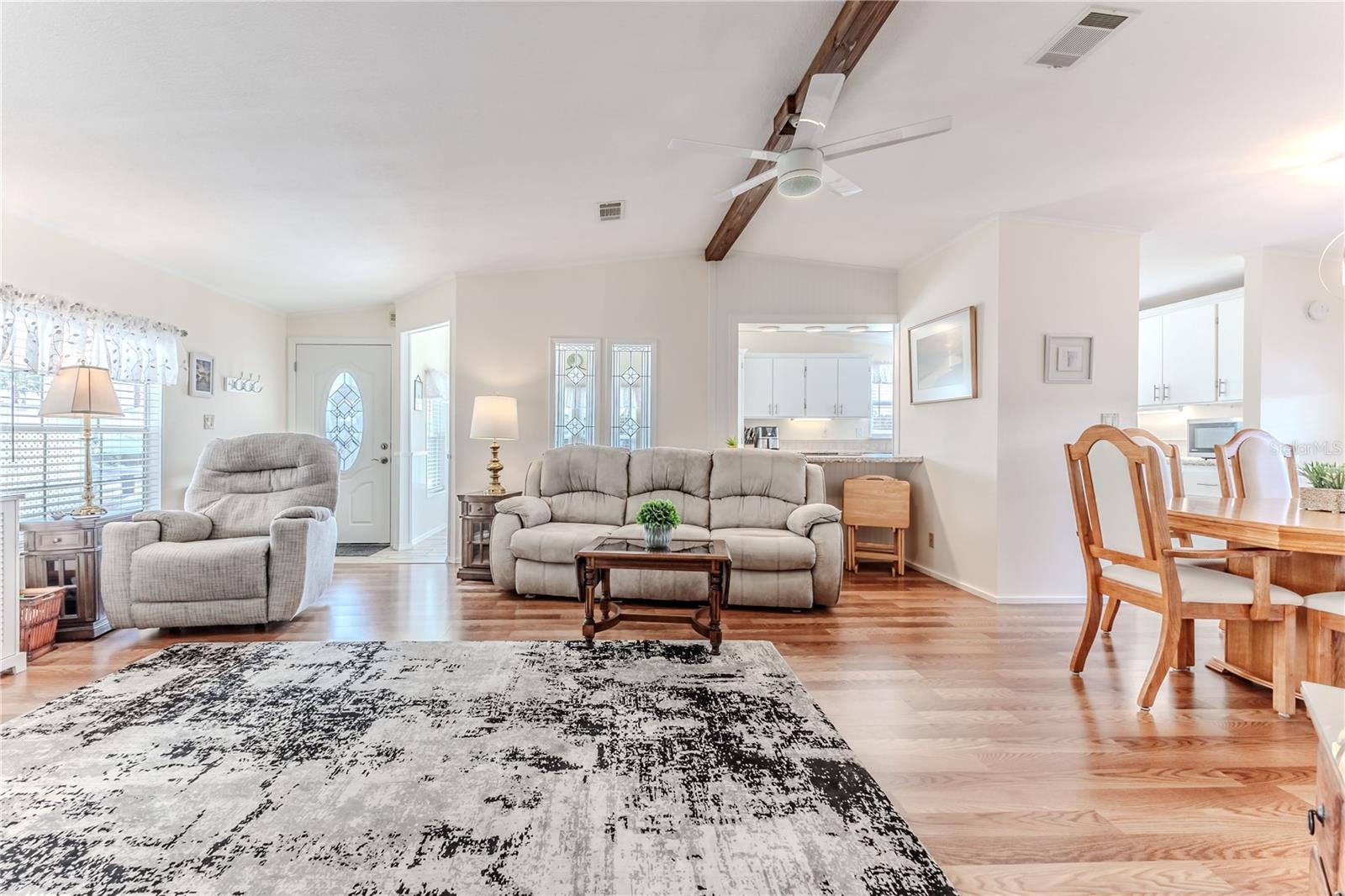 Open concept with beautiful beams that accentuate this exquisite home!