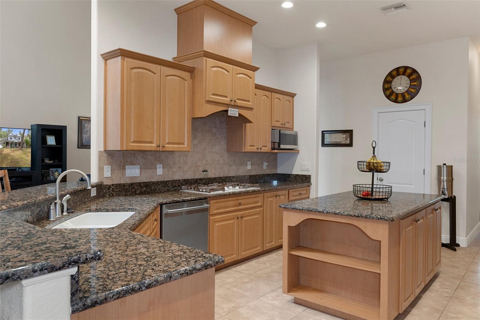 Kitchen with granite counters and tons of storage