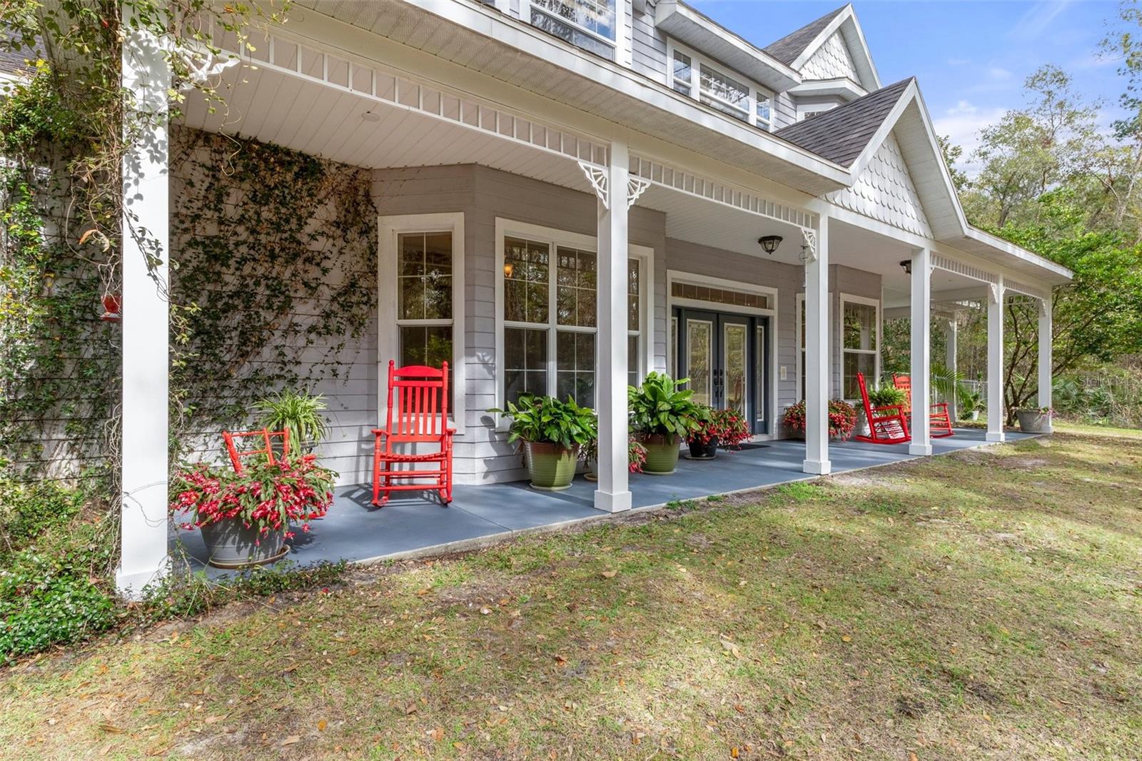 46 foot long front porch. Grab a rocker and a swing-you're going to love this porch.