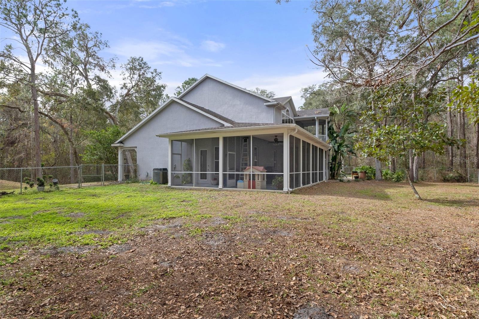 East side of home and backyard