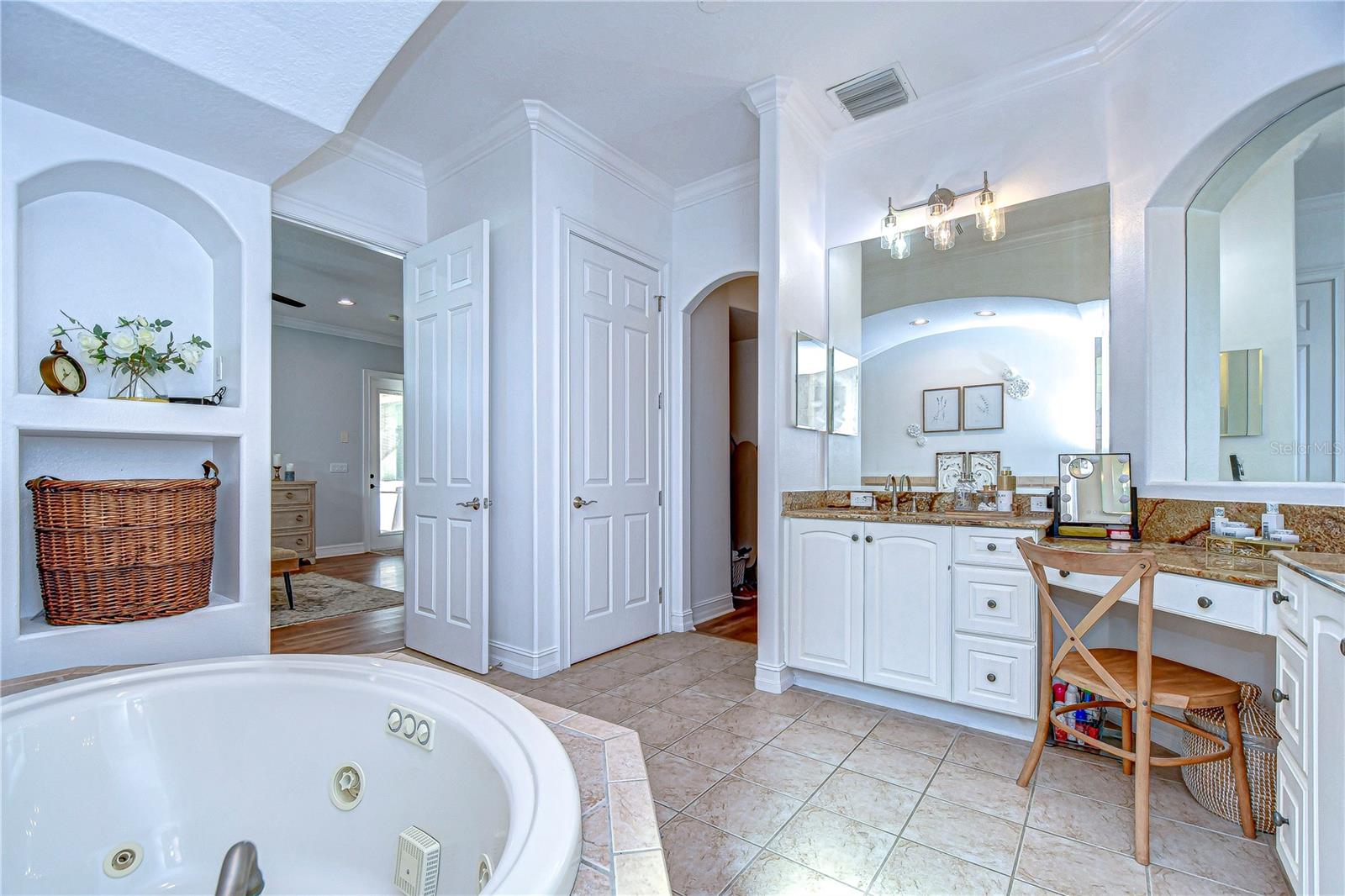 Dual sinks with designated vanity space.