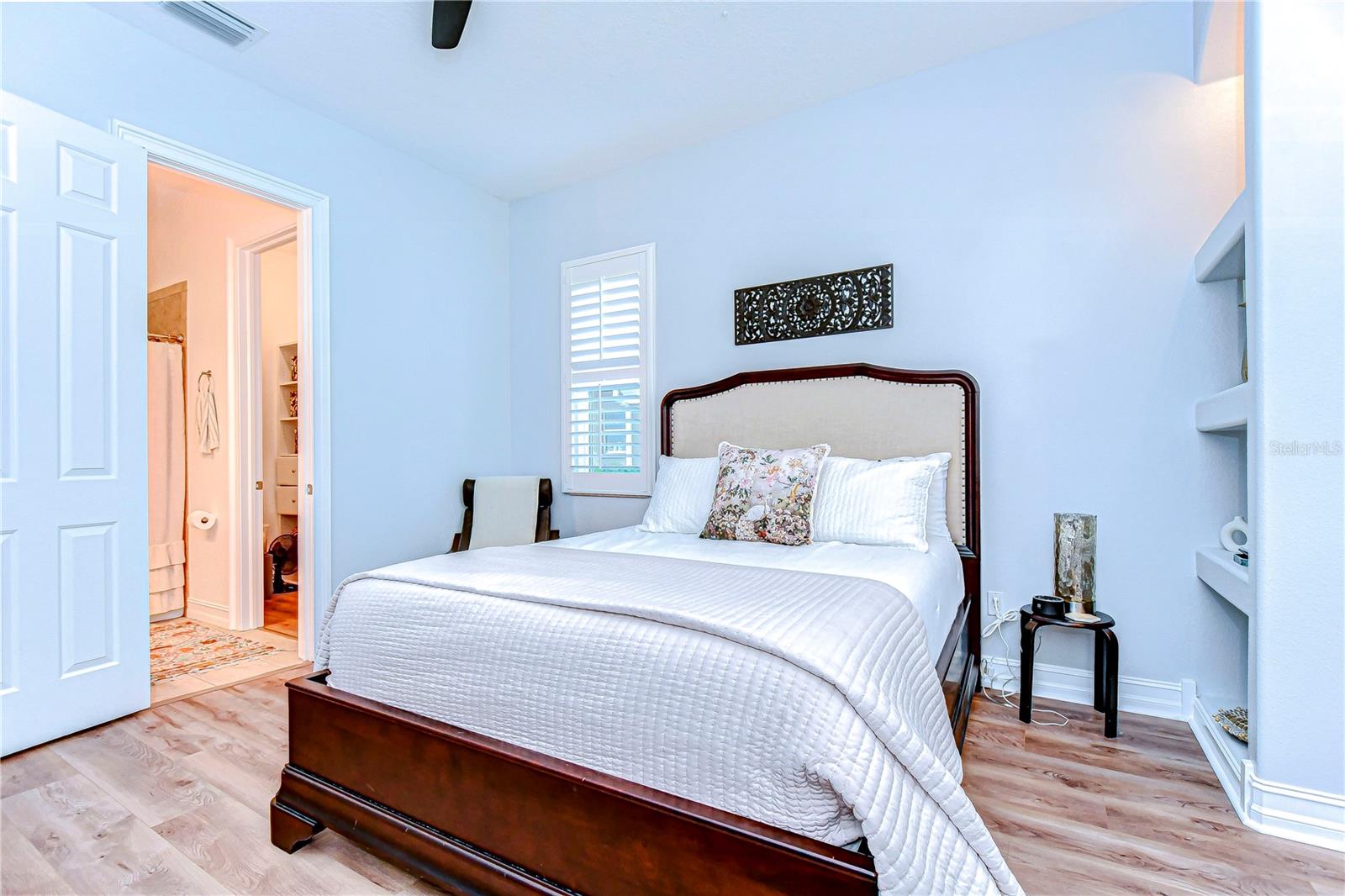 Third bedroom glows with natural light.