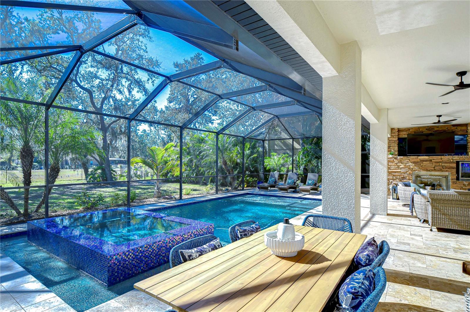 Relax and lounge in the pool and spa.