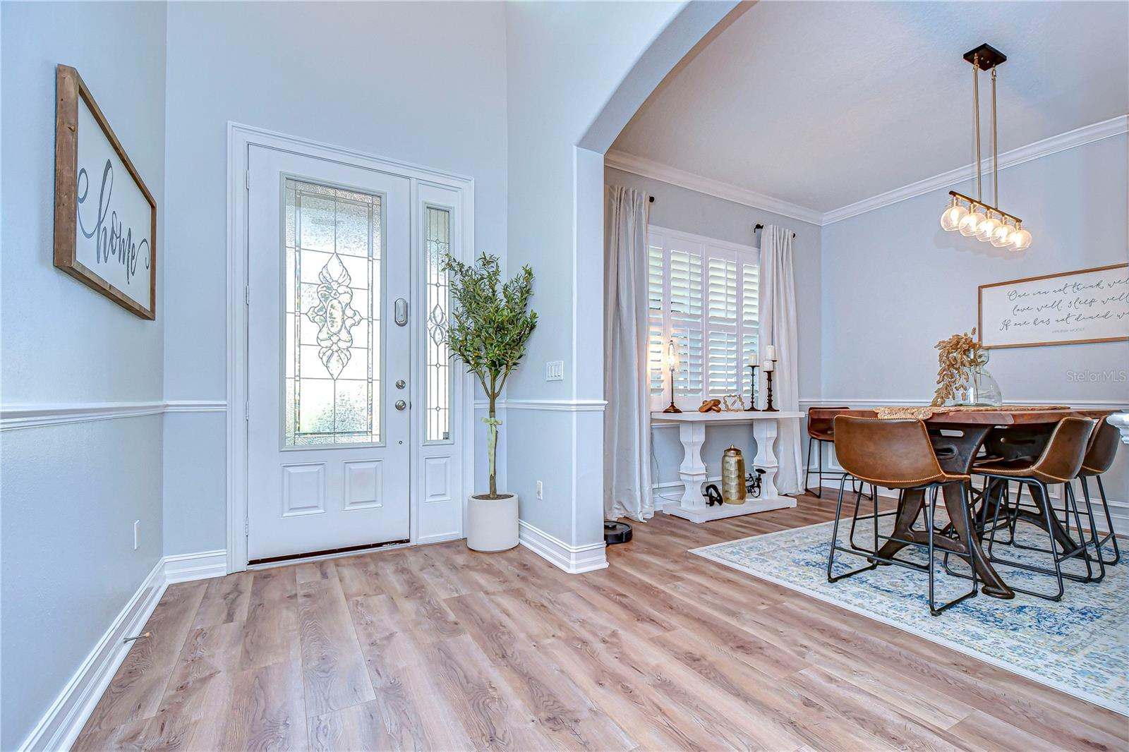 Step into the bright and airy foyer that welcomes you into the home.