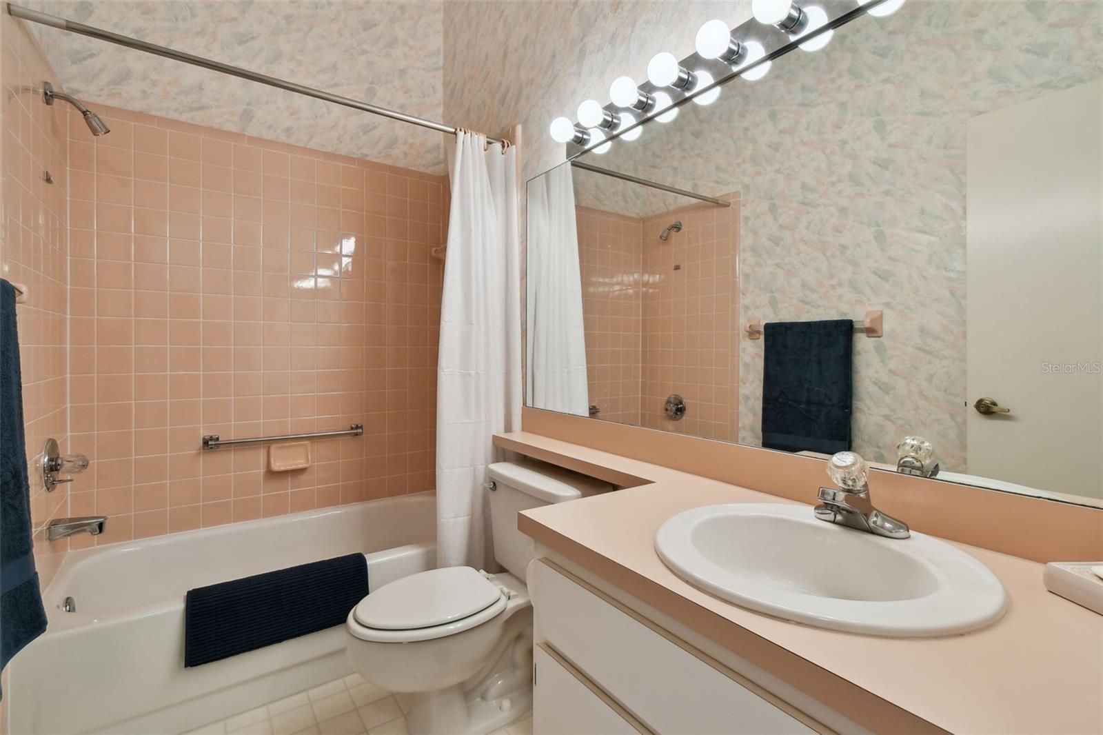 Meticulous bathroom with beautiful ceramic tiles.