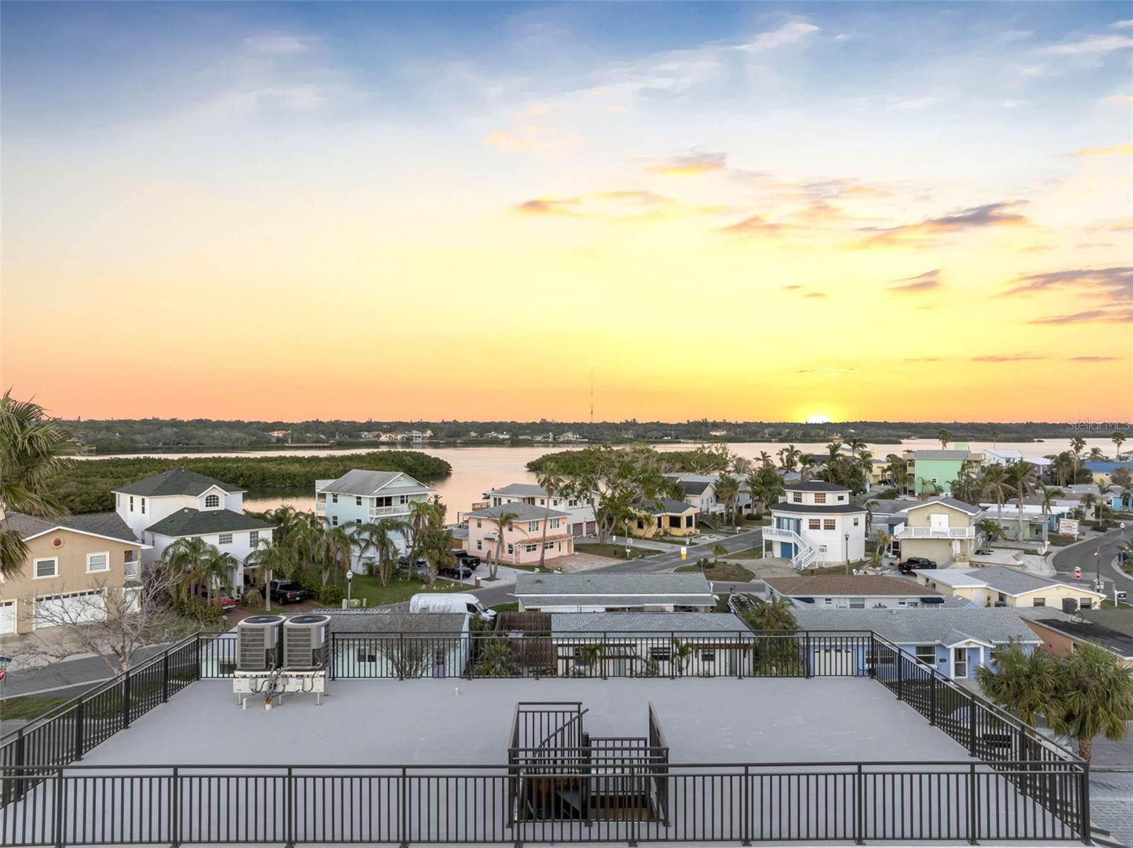 sunrise view off of rooftop terrace