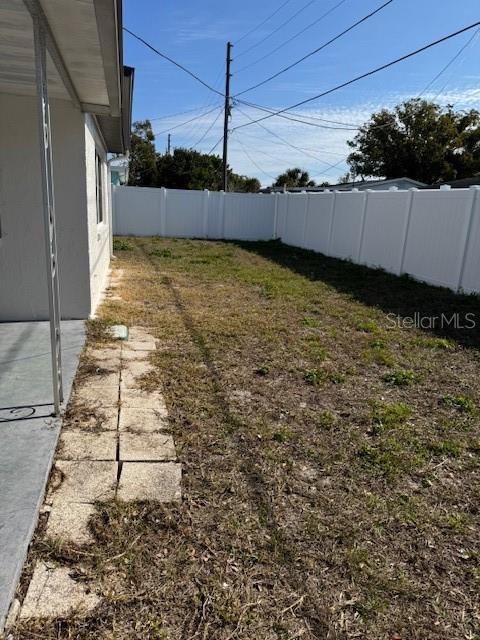 fenced back yard