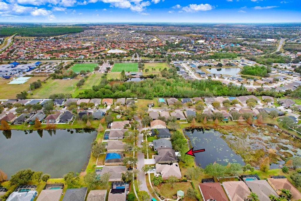 Aerial view of community and ponds