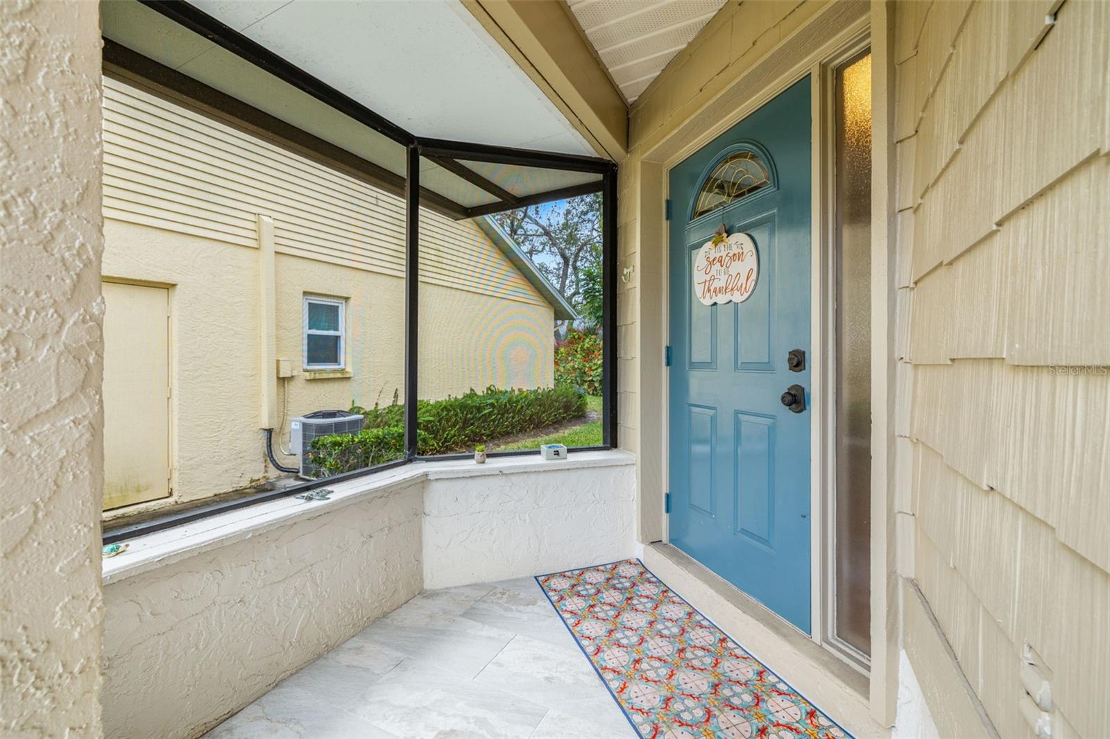 Screened-in / Covered front porch welcomes you home!