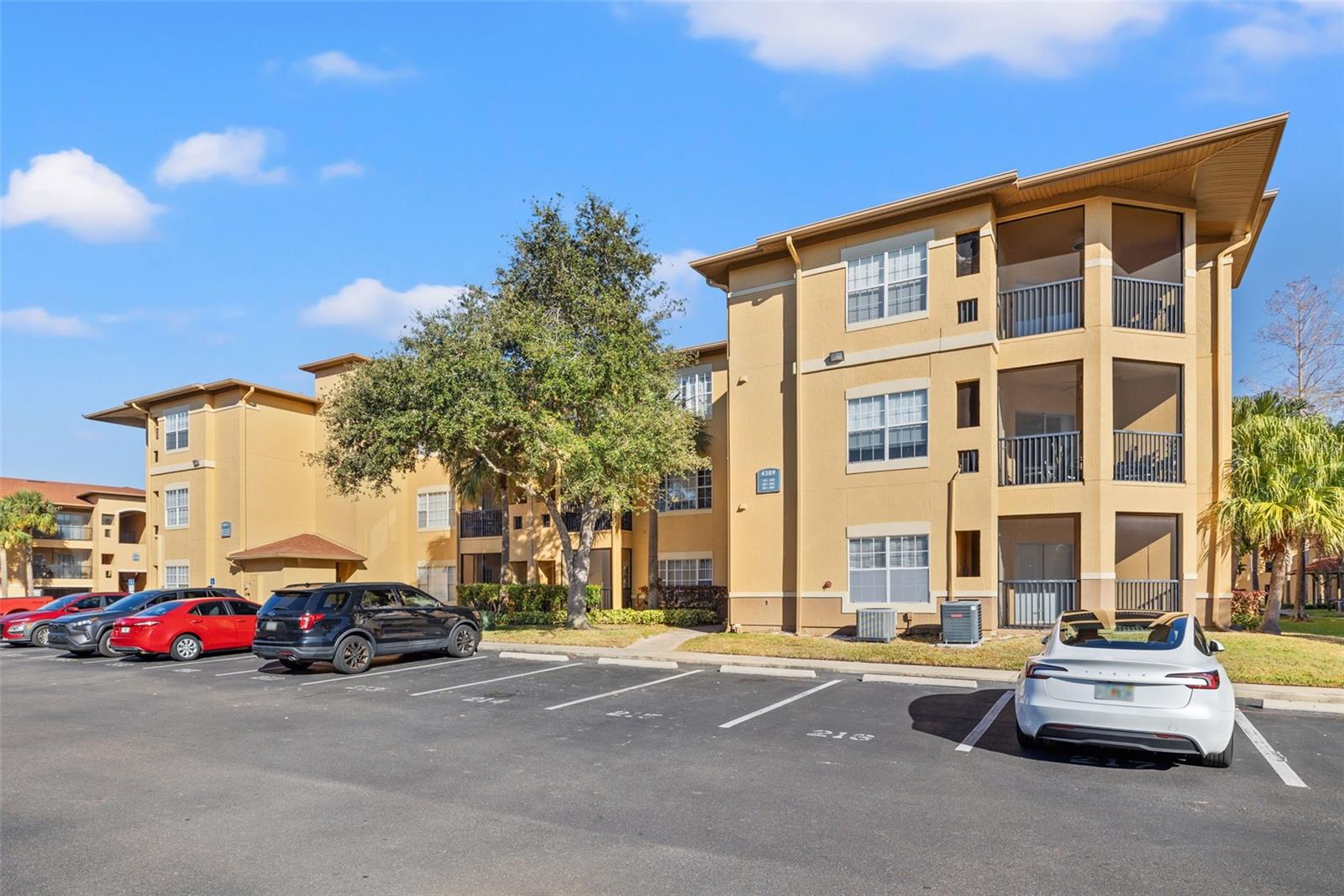 Located on the second floor with easy access to your reserved parking spots (1 is covered parking) AND your 1-car garage for a total of 3 parking spaces.