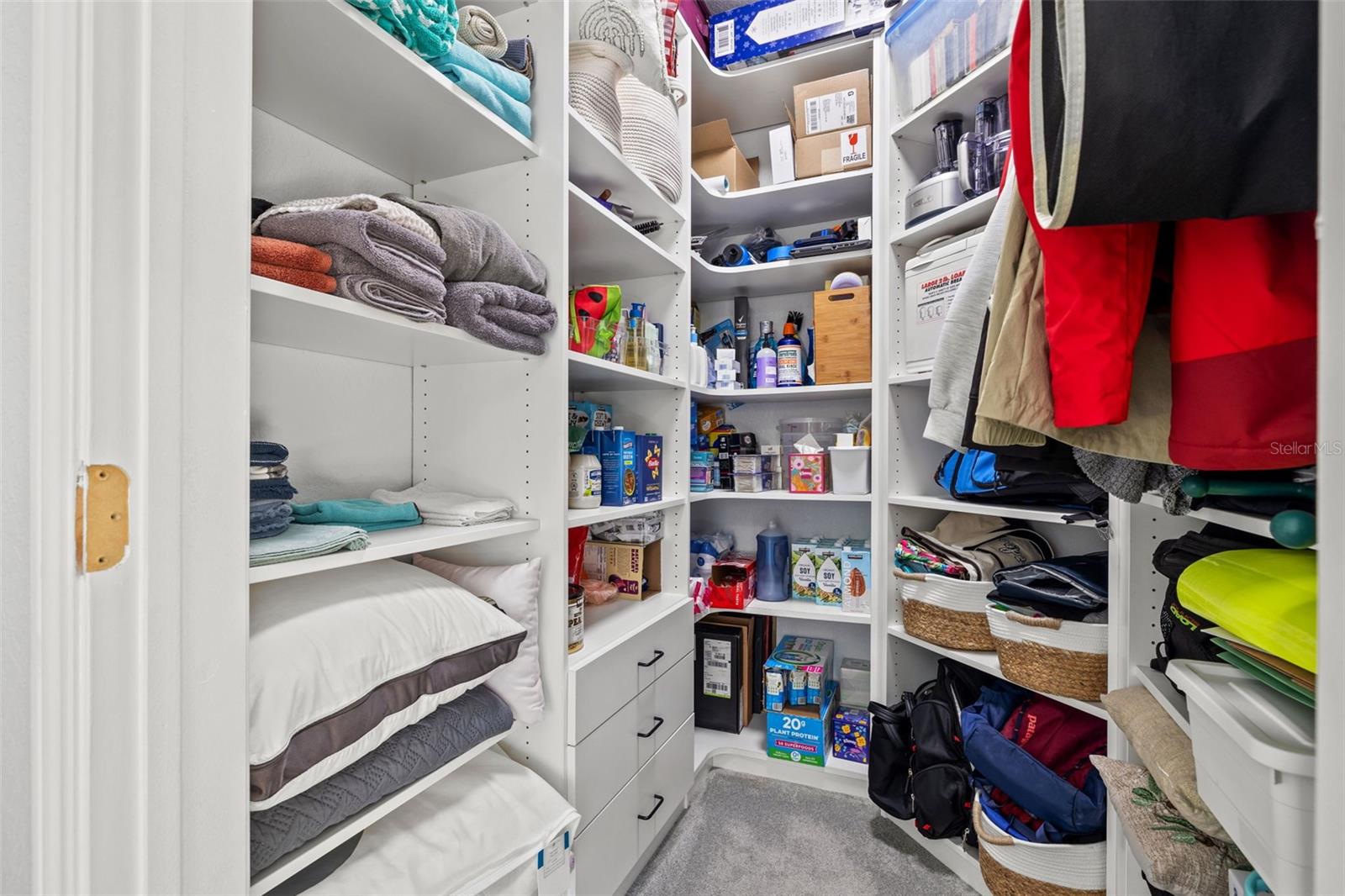 Bedroom 2 - Custom closets designed for convenient organization.