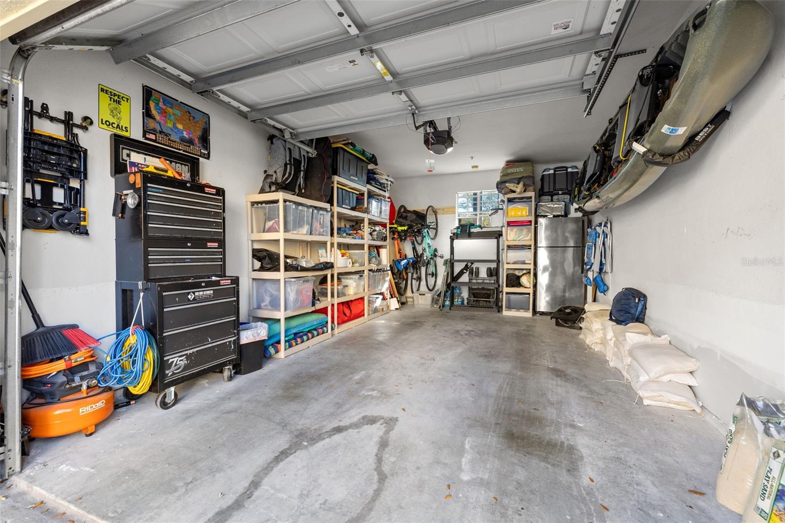 Private garage with garage door opener...