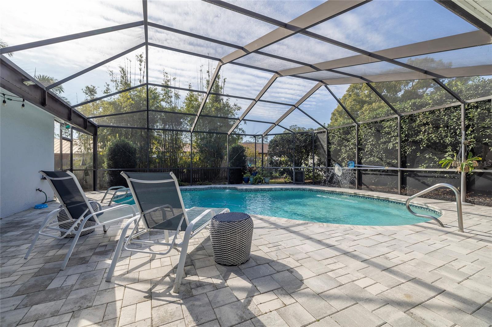 Screen enclosed swimming pool