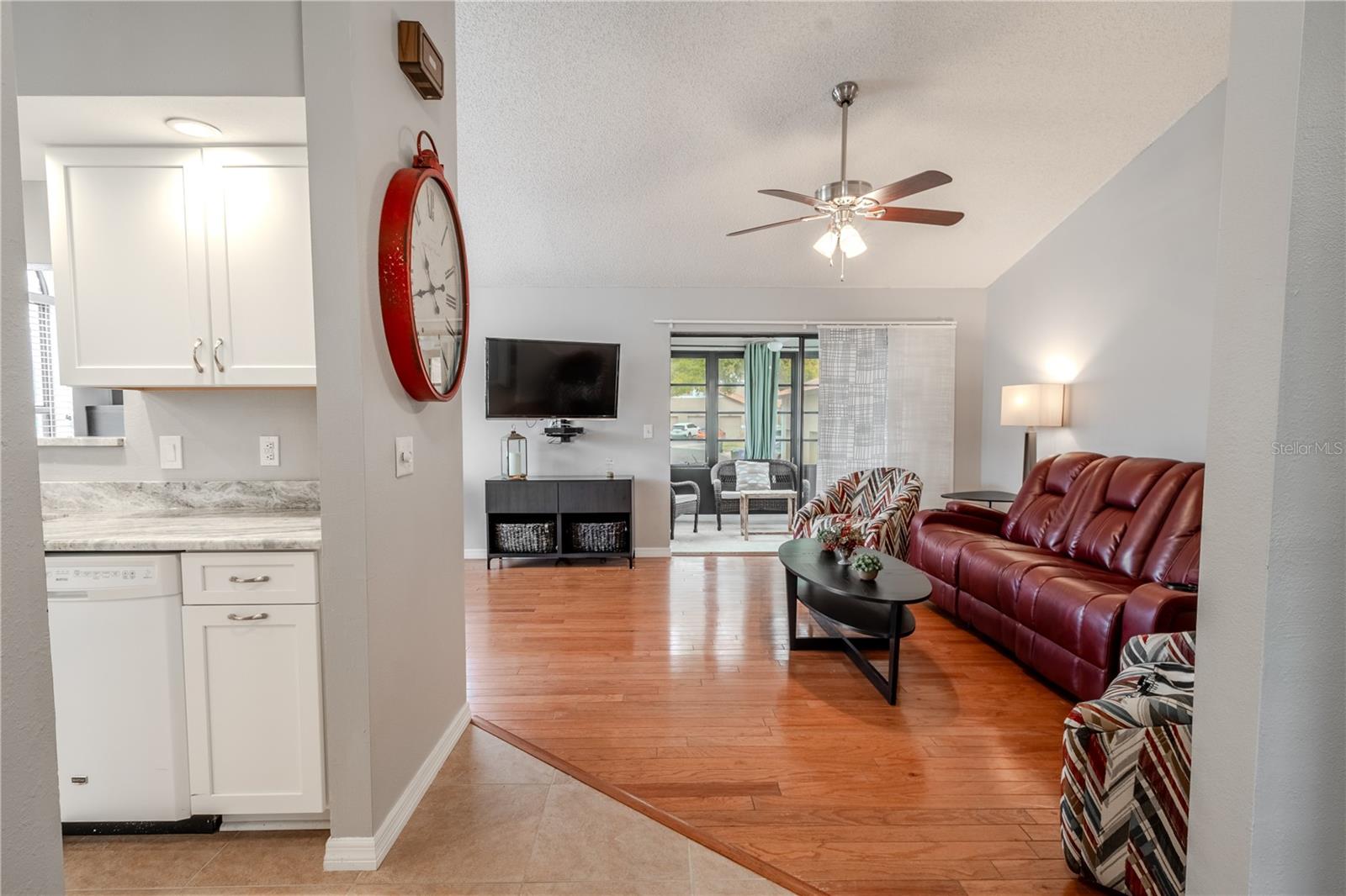 Enter into the foyer (with coat closet), open to the kitchen and living area.