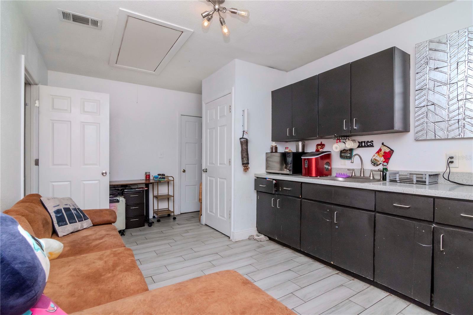 Garage Efficiency Apartment Kitchen and Living Area