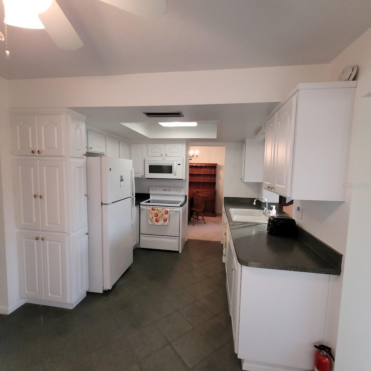 This 10X17 Kitchen has a lot of cabinets and counter space to work in.