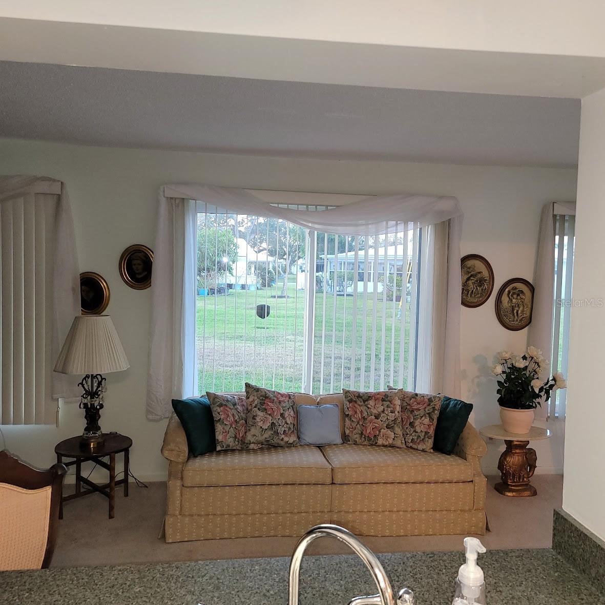 The passthrough in the kitchen allows for interesting views in the family room.