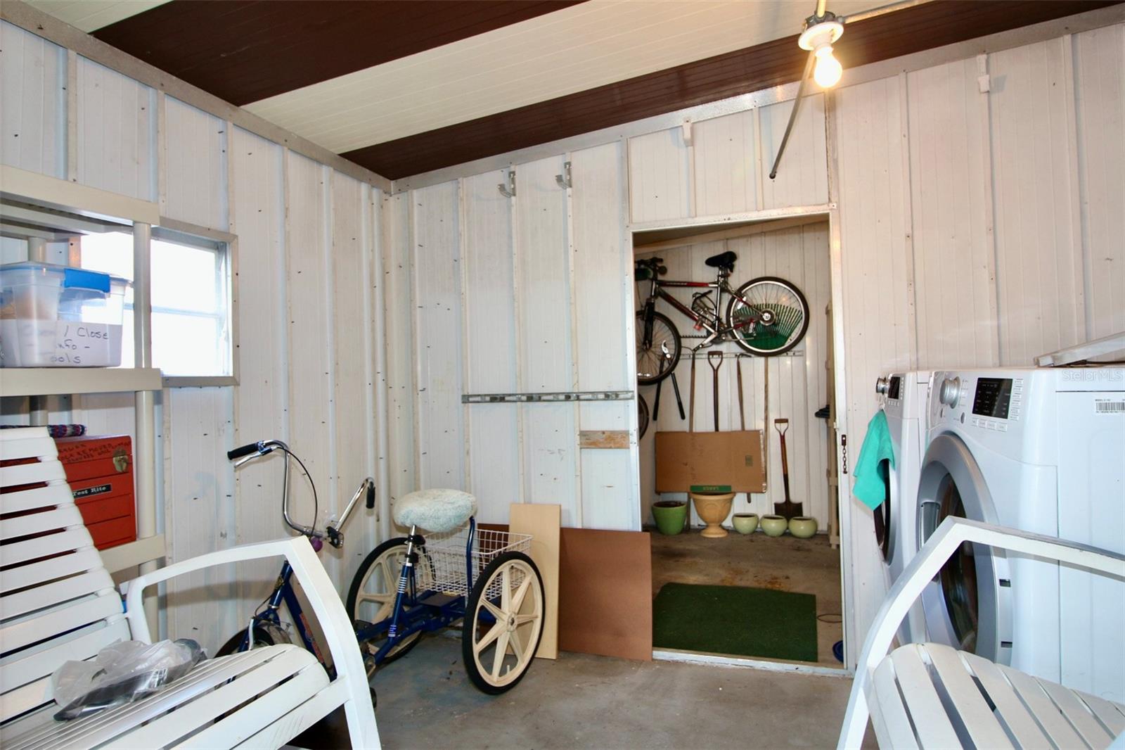 Laundry/Storage, with access to Golf Cart Garage.