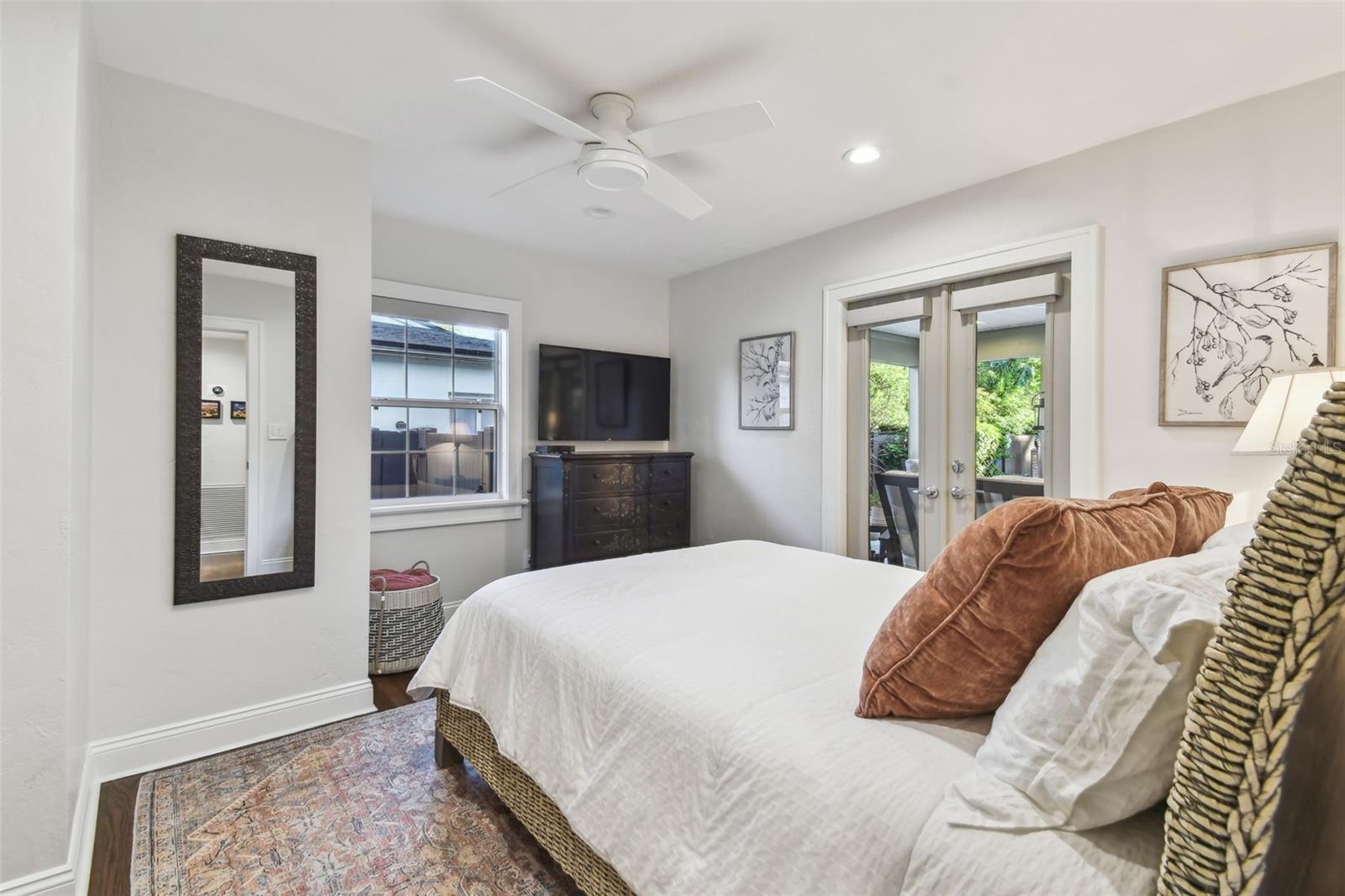 Downstairs guest bedroom overlooking the pool