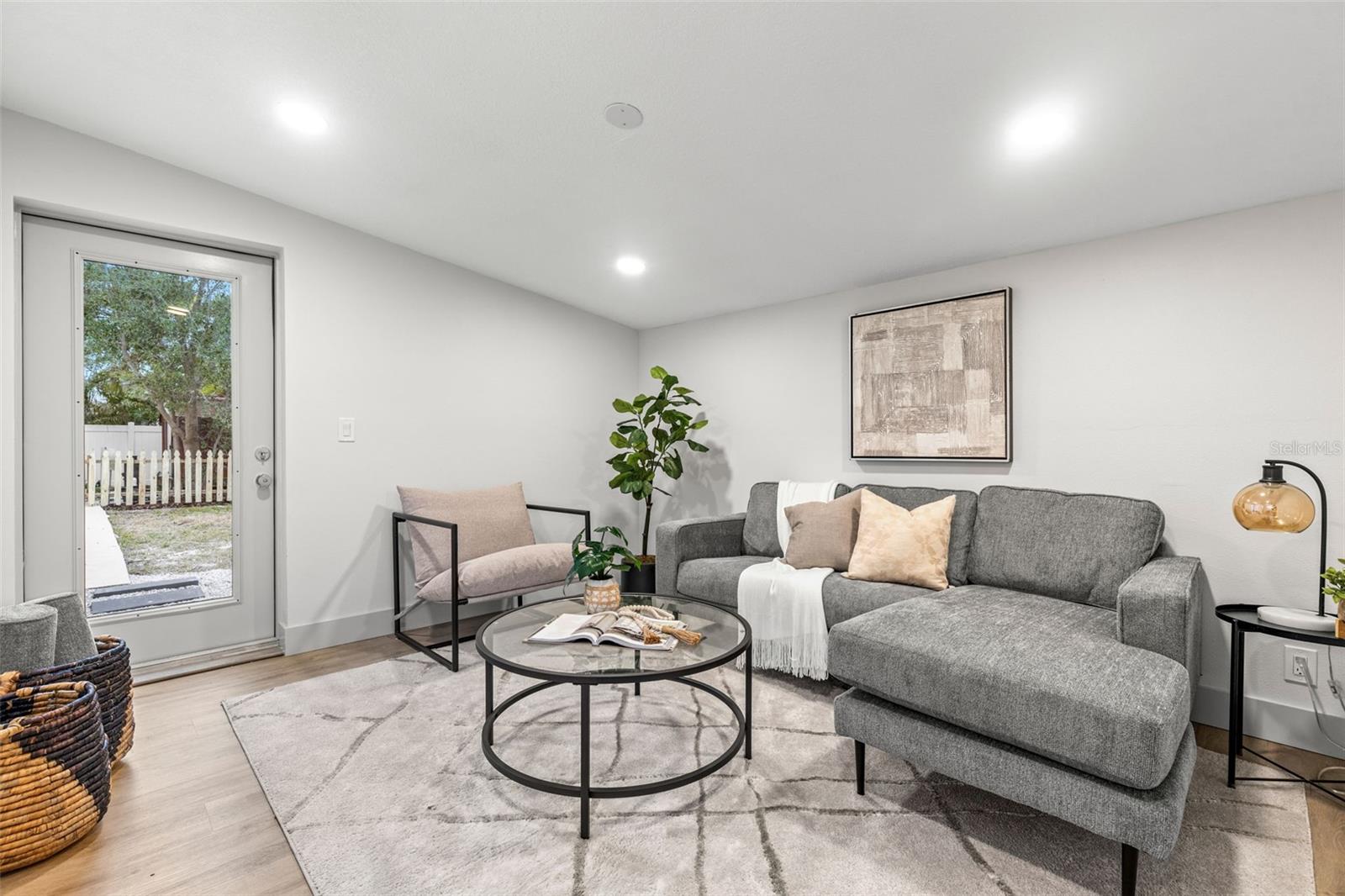 Living room with door to backyard