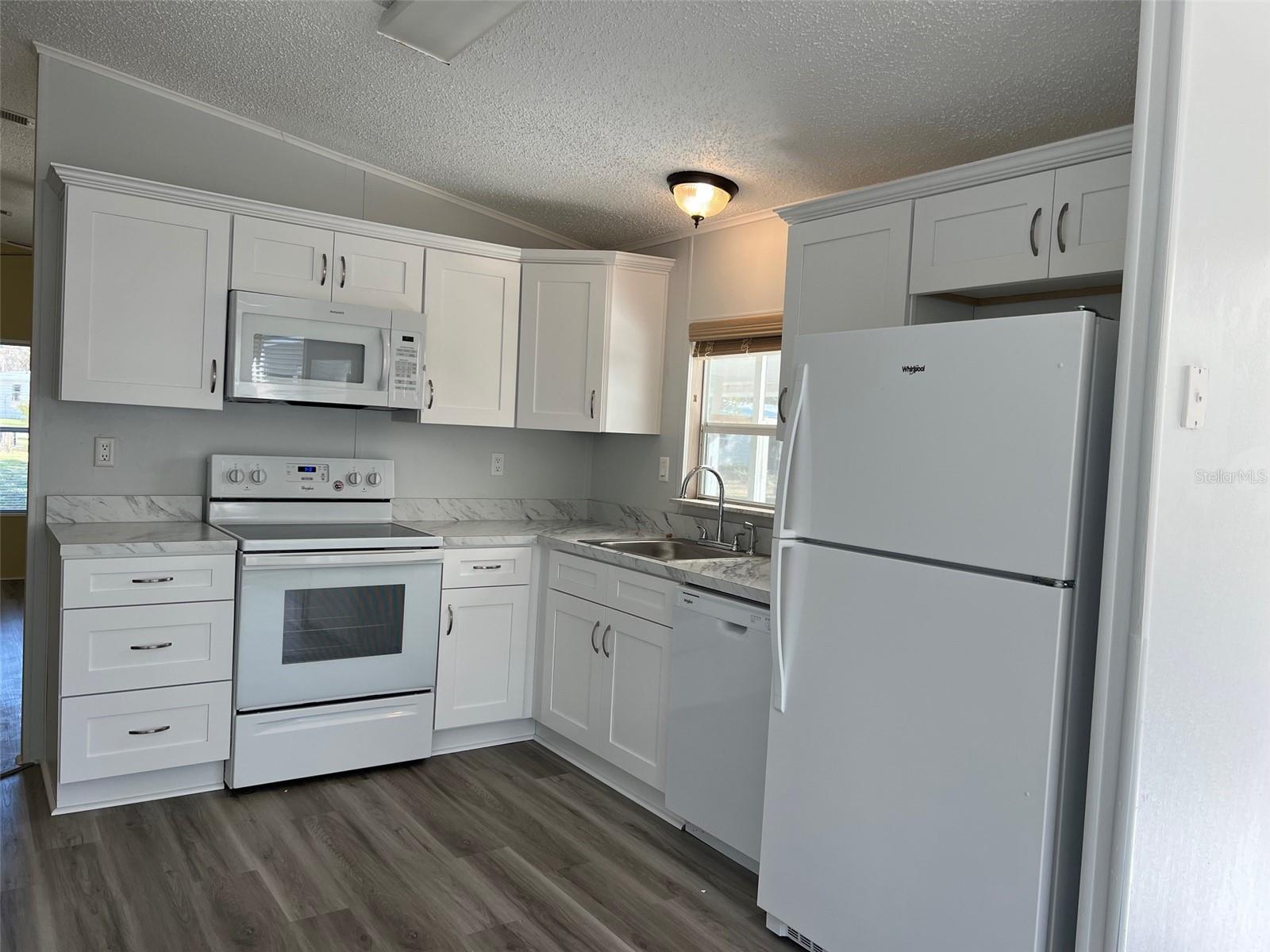 Crown Molding, plenty of cabinets and drawers and Soft Close Drawers.