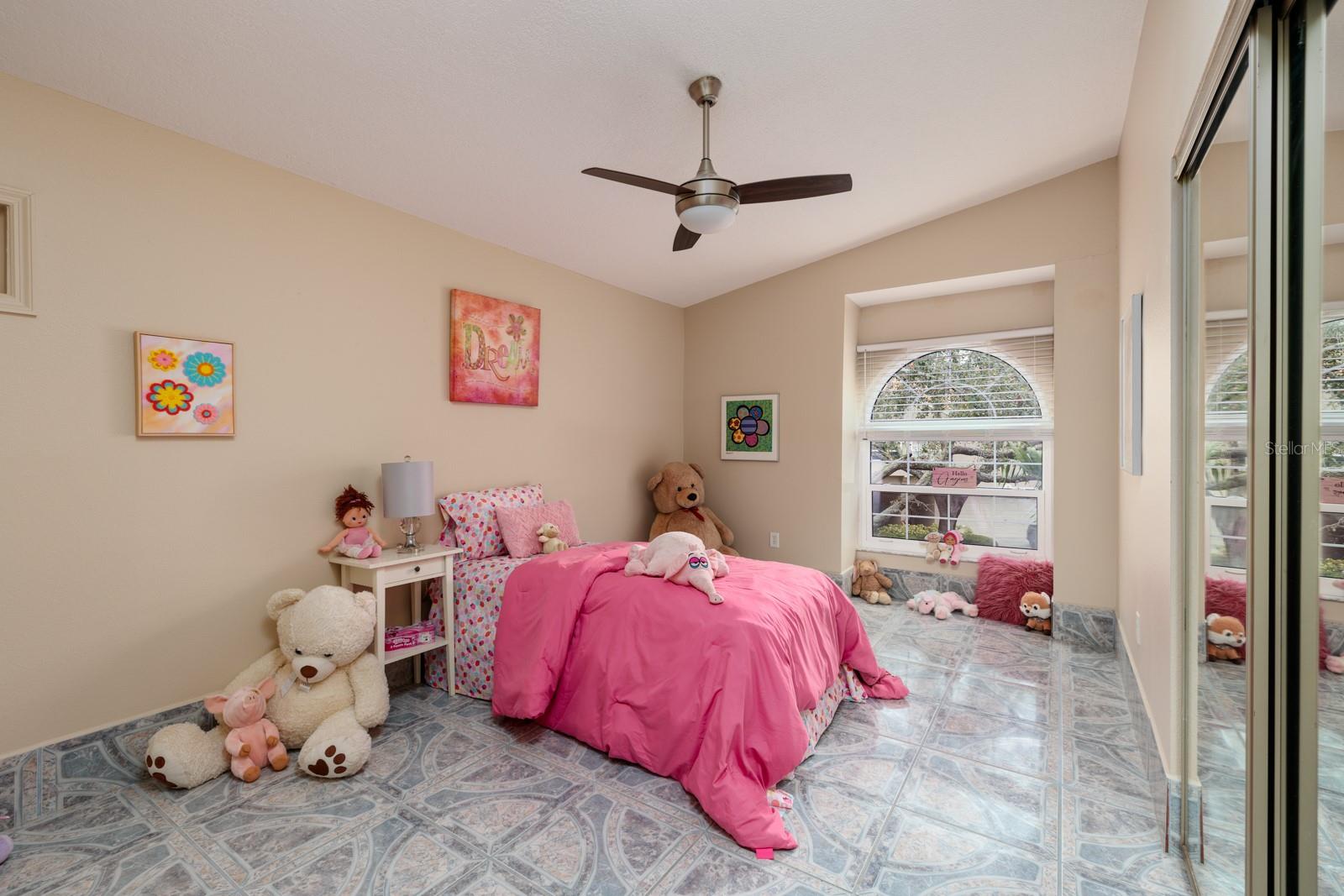 1 of 3 upstairs Bedrooms with pitched ceilings that open up with the light coming in!