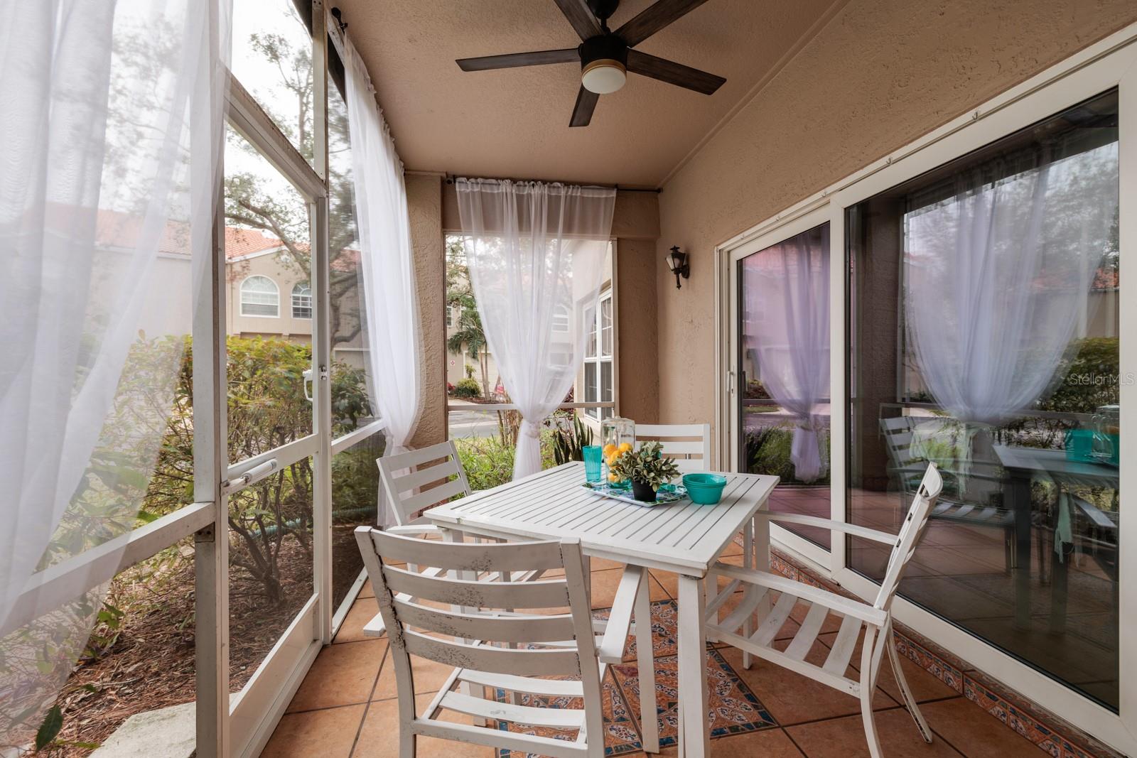 Enjoy Your screened porch with garden views.