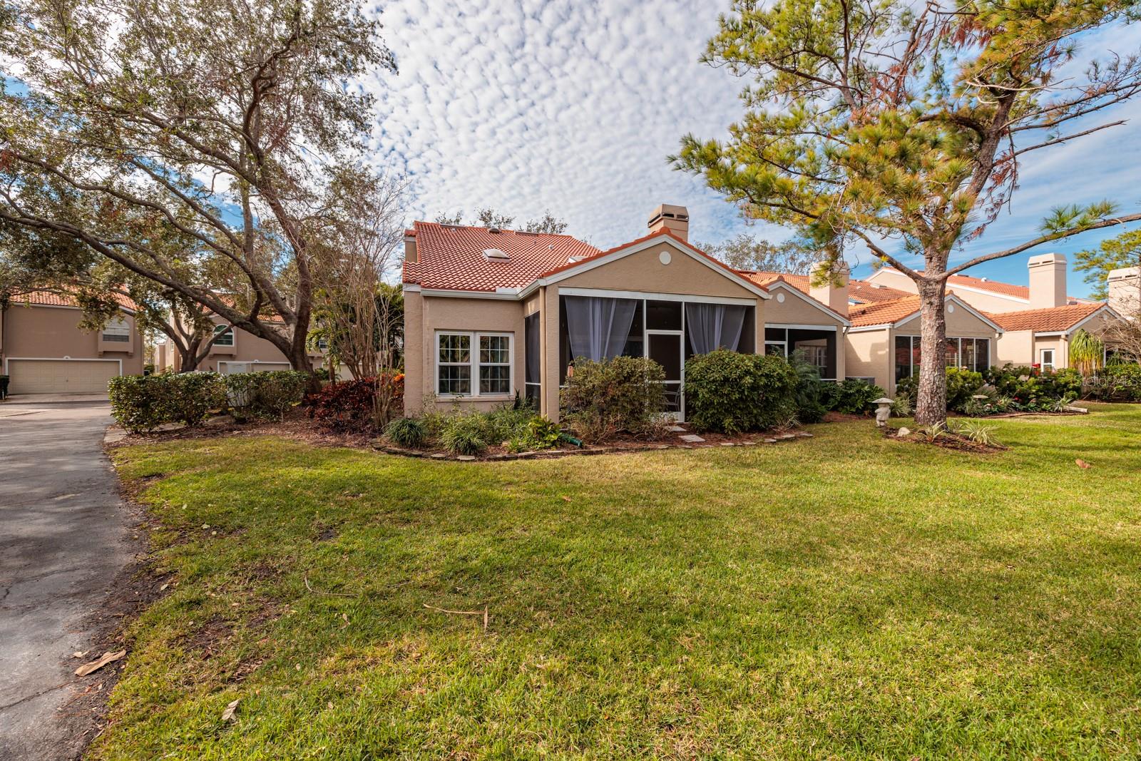 Garden views from Living/Dining/Kitchen areas as well as your screened back porch.