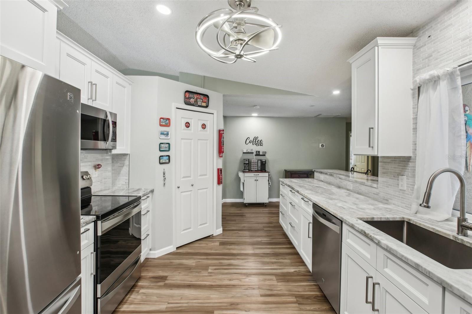 Gorgeous Chef's Kitchen overlooking the pool area.