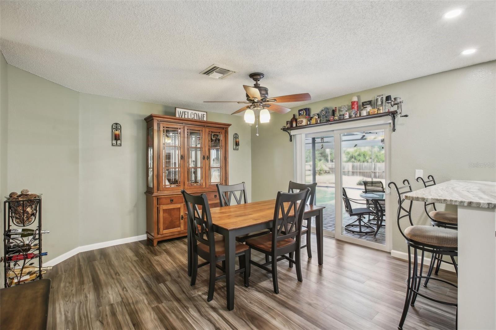 Dining Room with direct pool area view.