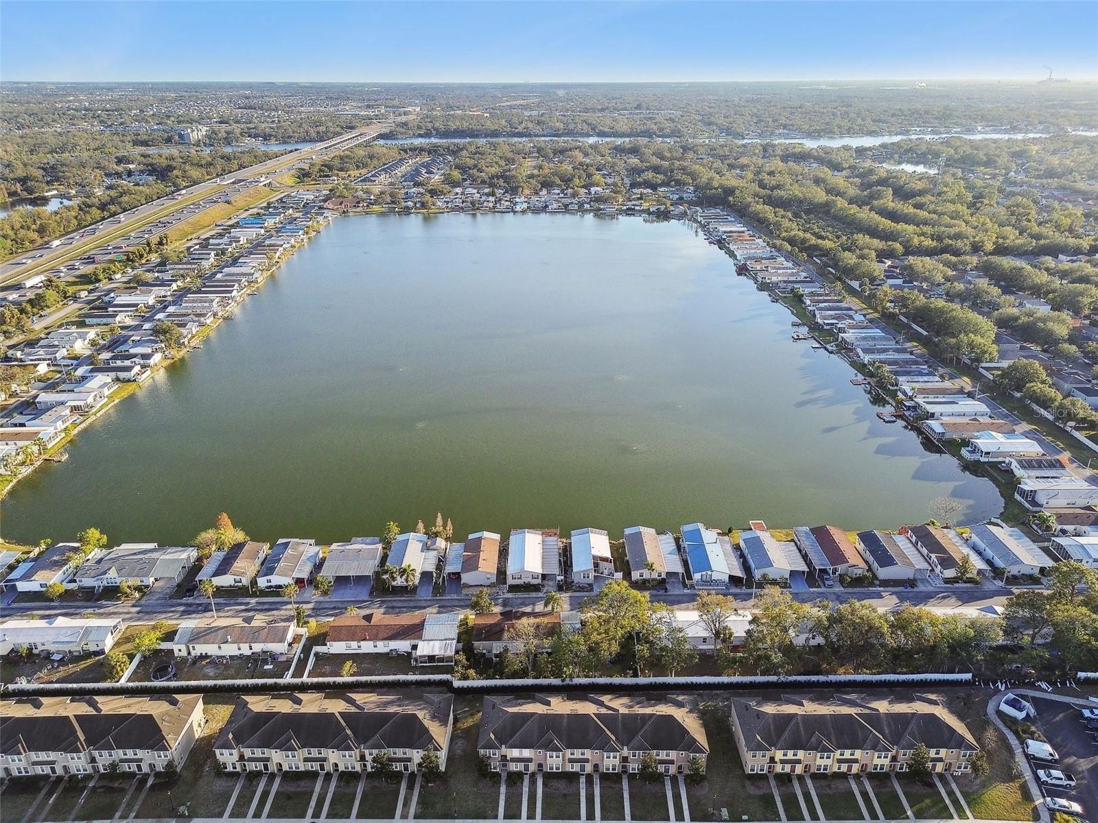 Aerial view of the townhome and the community behind.