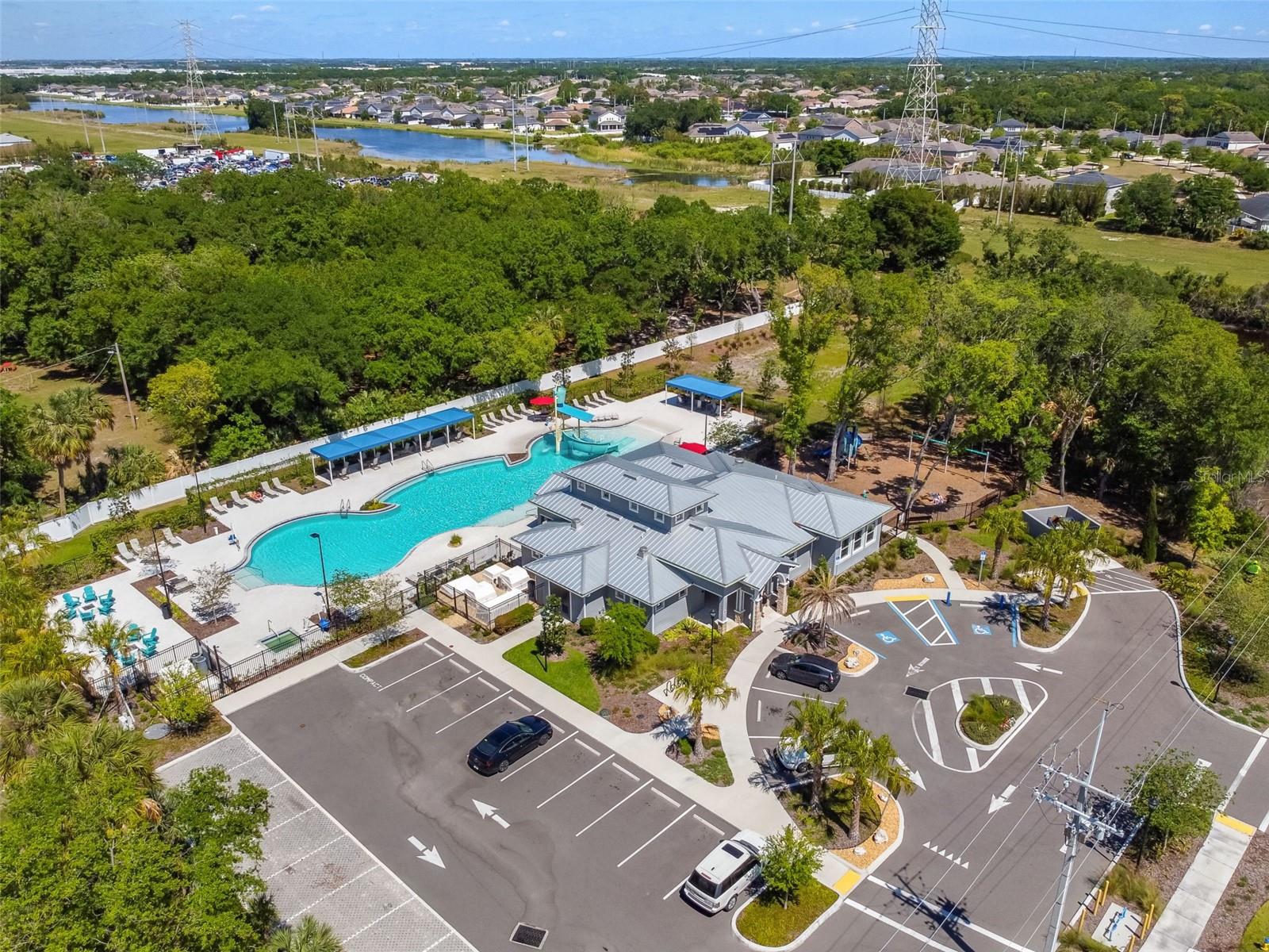 Additional pool with spa, community center and playground, along with a fitness center and community manager.