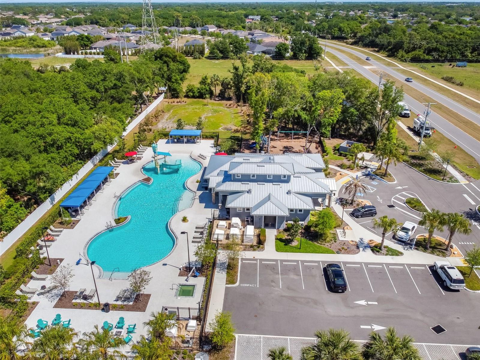 Aerial view of the community pool, spa and community center.