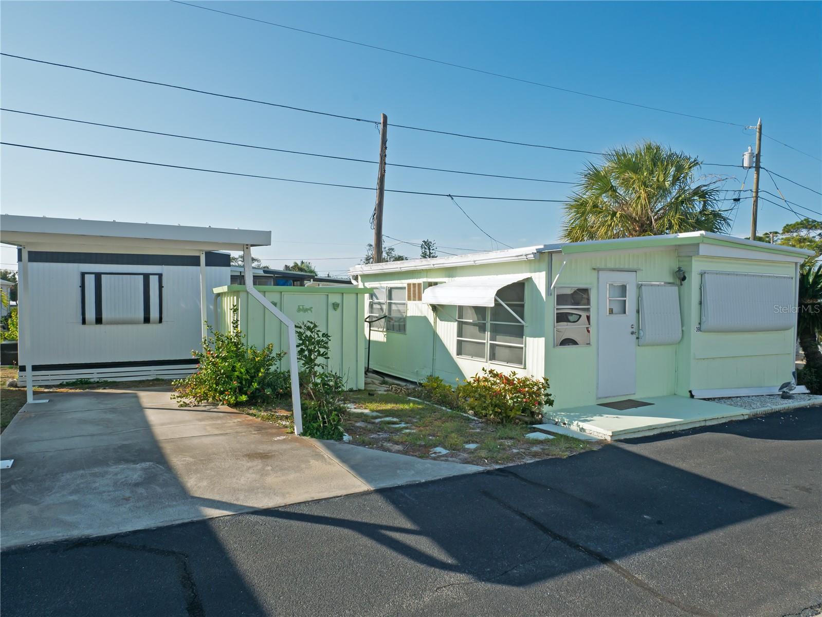 Welcome to your new home that comes with your own carport and a storage shed.