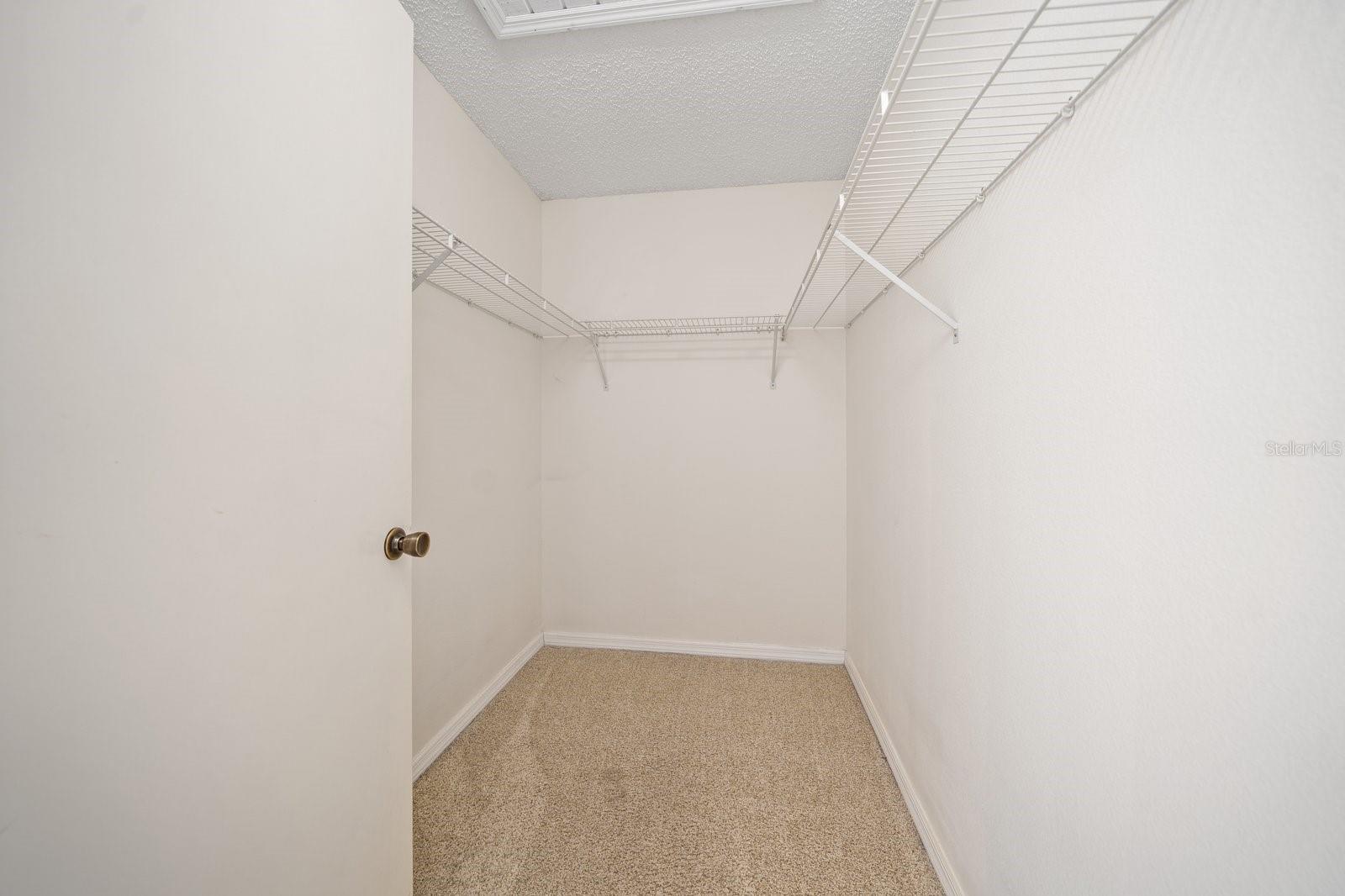 Primary walk-in closet